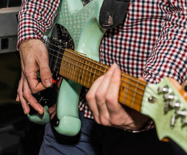 istock Close-up photo of guitar player 914458836