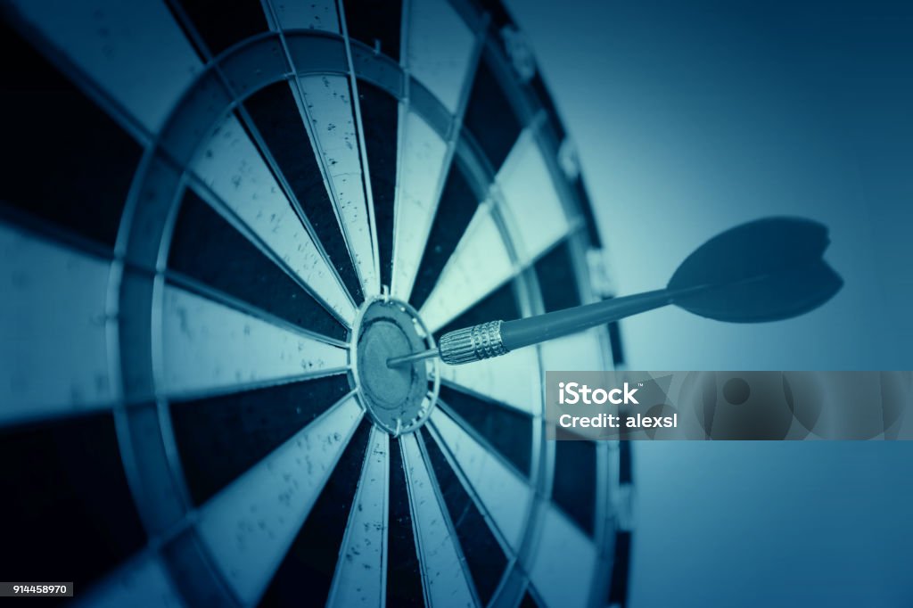 Dart on target business leadership concept Sports Target Stock Photo