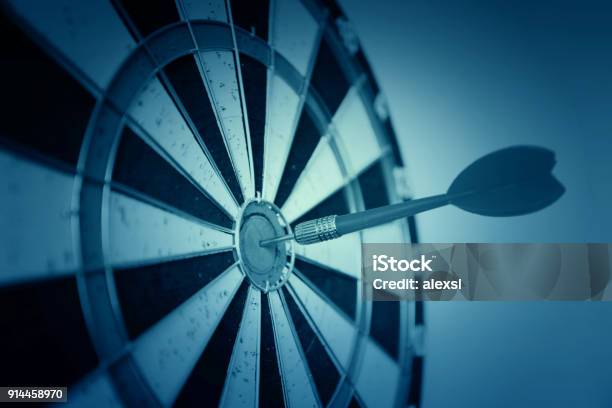 Dart On Target Business Leadership Concept Stock Photo - Download Image Now - Sports Target, Military Target, Accuracy