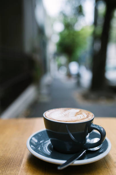 istock Cappuccino on a Wooden Table 914458972