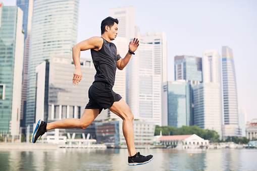 Training and running in Singapore's Marina Bay waterfront, Asia