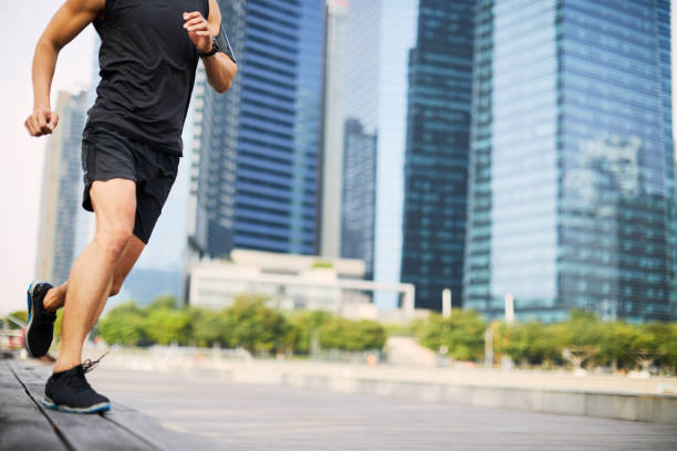 istock Training and running in Singapore's Marina Bay waterfront, Asia 914465272
