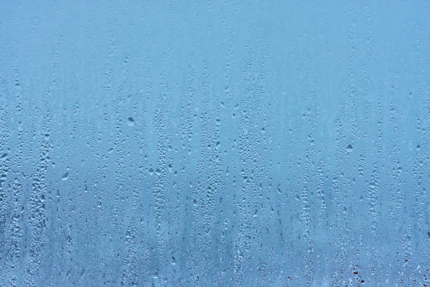istock Drops water on the clear glass background 914466960