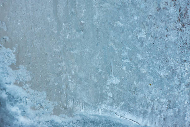 istock Frozen glass, ice texture on window, natural background 914467134