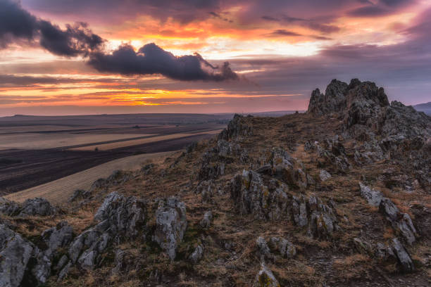 istock Beautiful rural landscape with dramatic clouds in the sunset 914467308
