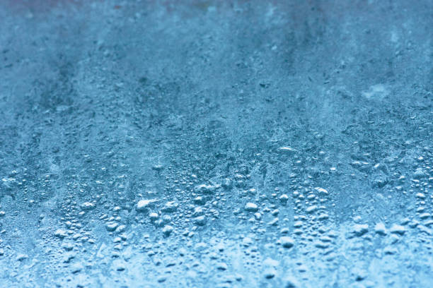istock Frozen glass, ice texture on window, natural background 914469698