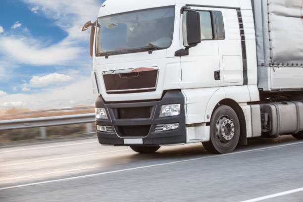istock truck transports freight on highway 914473774