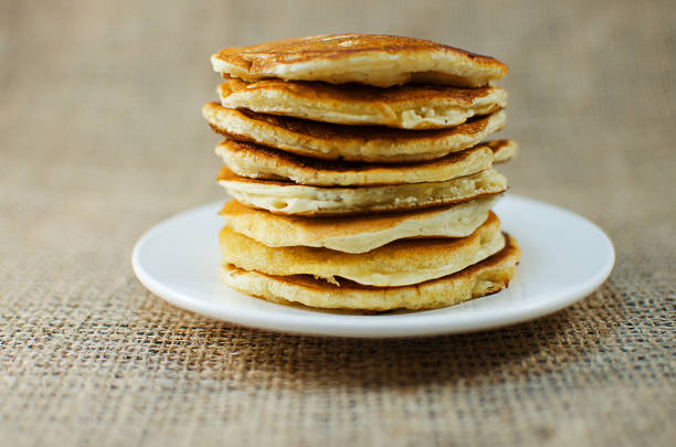istock Fried pancakes are a mountain on a plate of sweets 914474990