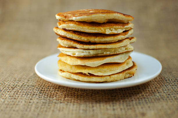 istock Fried pancakes are a mountain on a plate of sweets 914475022