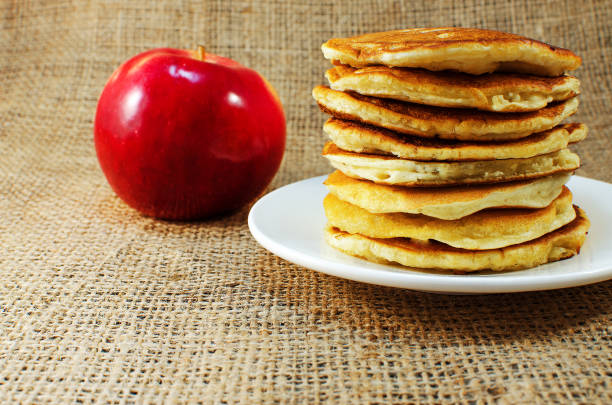 istock Fried pancakes are a mountain on a plate of sweets 914475080