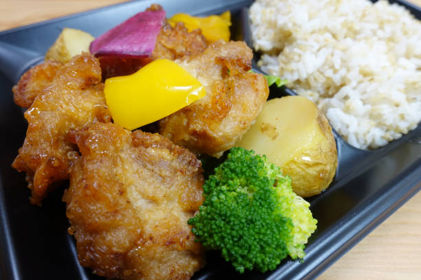 istock Japanese style bento (lunch box) with fried chicken and vegetables. 914477180