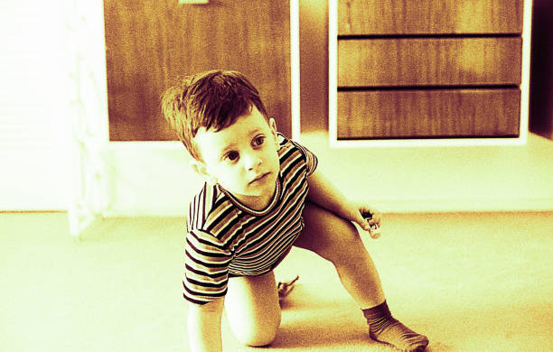 istock Toned image of a toddler on floor 914478632