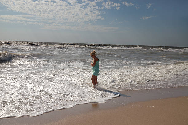 istock woman and  sea. 91447914