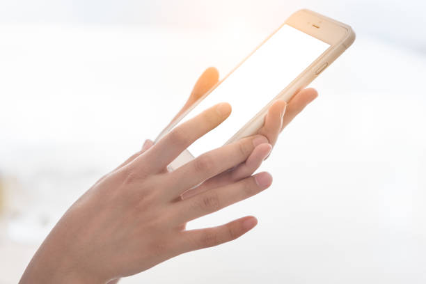 istock Close up of female hand using smartphone 914482118