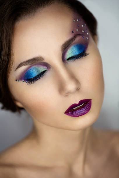 istock girl with colorful eye makeup 914482276