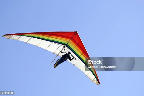 A Person Hang Gliding On A Clear Day Stock Photo - Download Image Now - Hang Glider, Hang-gliding, Glider
