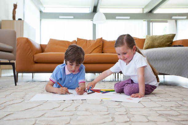 istock Children drawing with color pencils 914485076