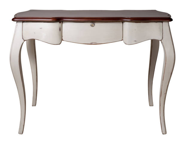 istock Retro wooden desk table with white legs and three drawers isolated on white background including clipping path 914486778