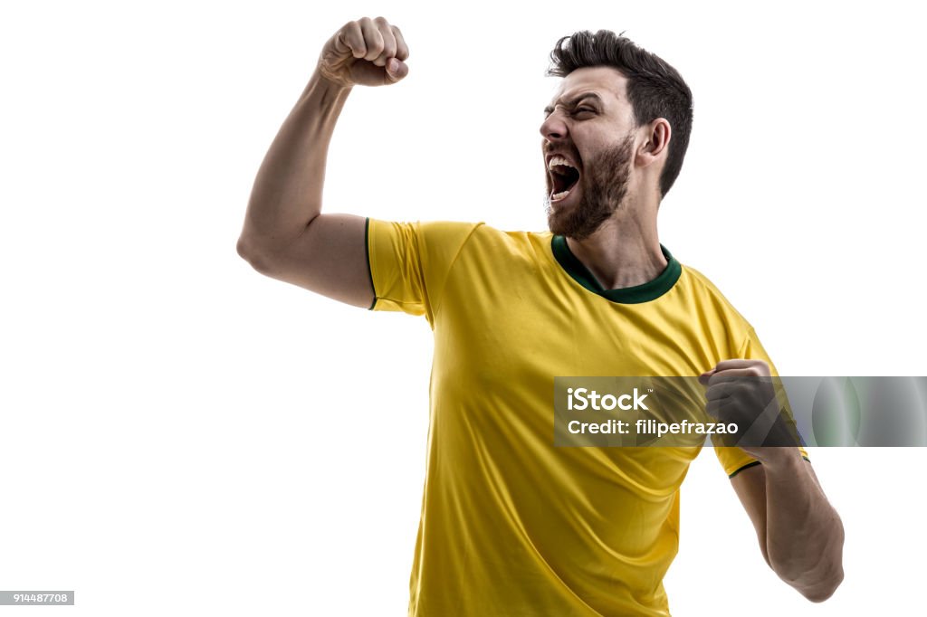Brazilian male athlete / fan celebrating on white background sport collection Fan - Enthusiast Stock Photo