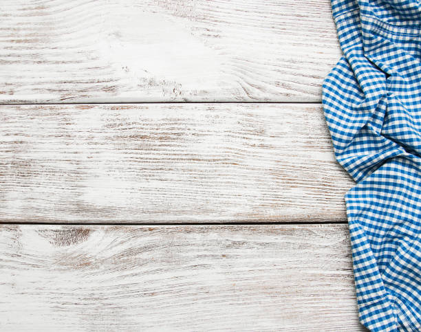 istock Checkered napkin on a wooden background 914491006