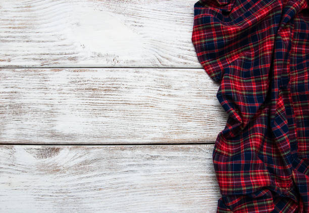 istock Checkered napkin on a wooden background 914491074