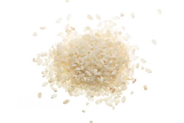 istock rice grains isolated on white background. Top view. Flat lay 914494068
