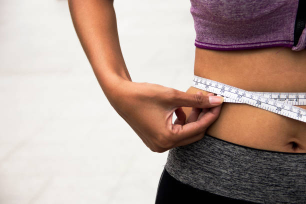 istock Beautiful Waist measurement close up 914497416