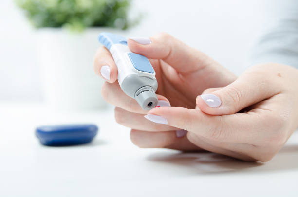 istock Diabetes doing blood glucose measurement. 914497456