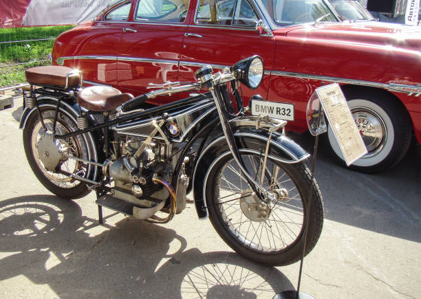 BMW motorbike old vs. new, classic vs modern, street style. Image made in Serbia with idea to compare same model of the motorbike from past century and newer age. Photo was made in november 2015 and on the photo is very rare classic BMW motorbike. Idea was to present design and concept from the past comparing to modern motorbike today.