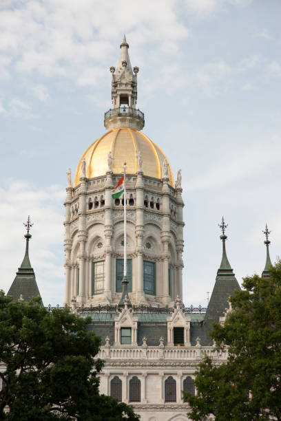 Gold Dome of Connecticut State Capitol Gold-domed architecture of Connecticut State Capitol, a Victorian Gothic building located north of Capitol Avenue and south of Bushnell Park in downtown Hartford, Connecticut, USA. american hartford gold usa stock pictures, royalty-free photos & images
