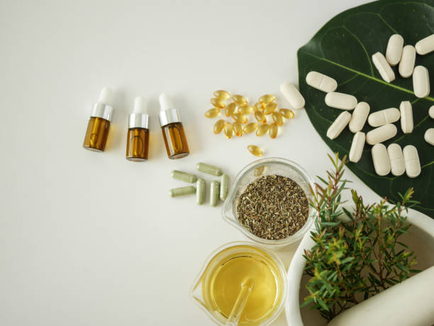 istock alternative herb medicine. herbal vitamin on white background. 914503626