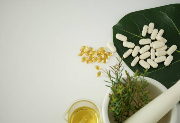 istock alternative herb medicine. herbal vitamin on white background. 914503732