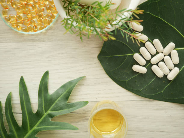 istock alternative herb medicine. herbal vitamin on white background. 914503738