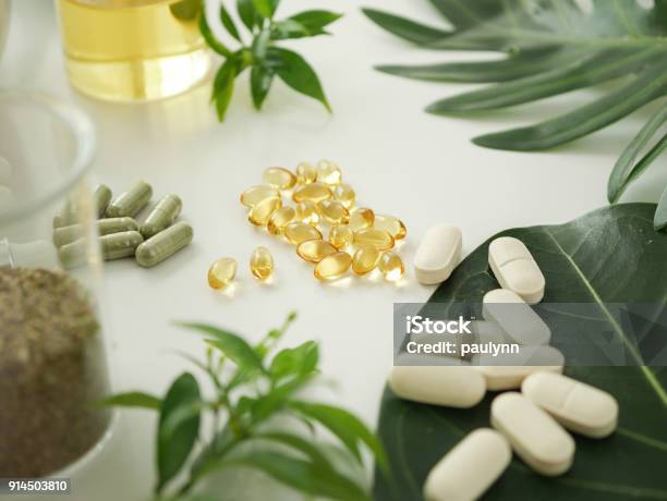 Alternative Herb Medicine Herbal Vitamin On White Background Stock Photo - Download Image Now