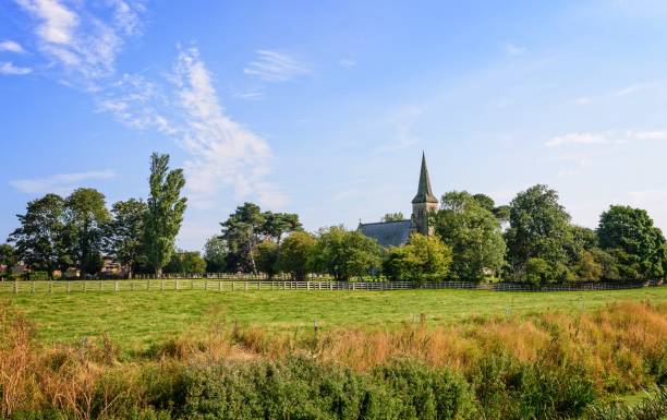 istock Field and church spire. 914507846