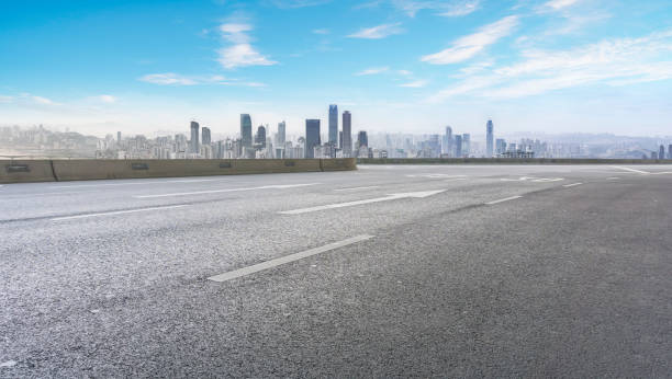 The road, the ground, and the beautiful skyline of Chongqing The road, the ground, and the beautiful skyline of Chongqing panoramic country road single lane road sky stock pictures, royalty-free photos & images