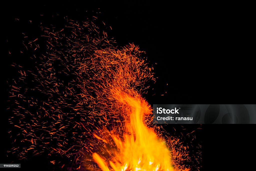 The fire Flames on black background Sparks Stock Photo