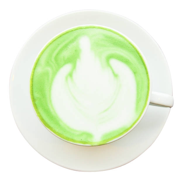 istock Top viwe. Milk green tea latte in cup on isolated white background 914509582