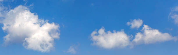 istock Panorama view of white clouds in blue sky for background 914512598