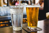 Beer and water in a bar