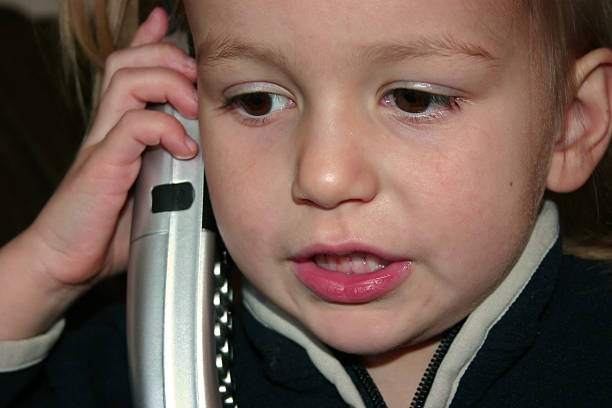 istock Little girl on the phone 91451963