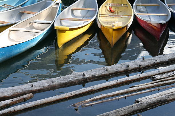 colorful canoes stock photo