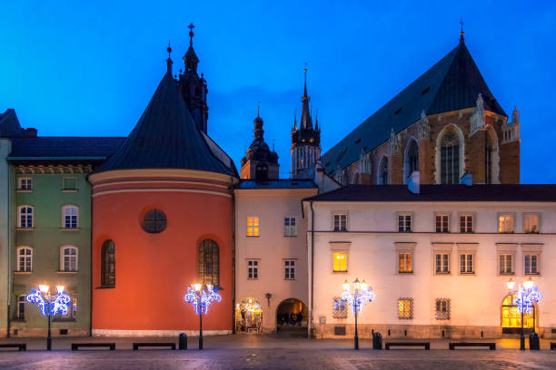 istock Small Market Square in Krakow at evening. 914523058