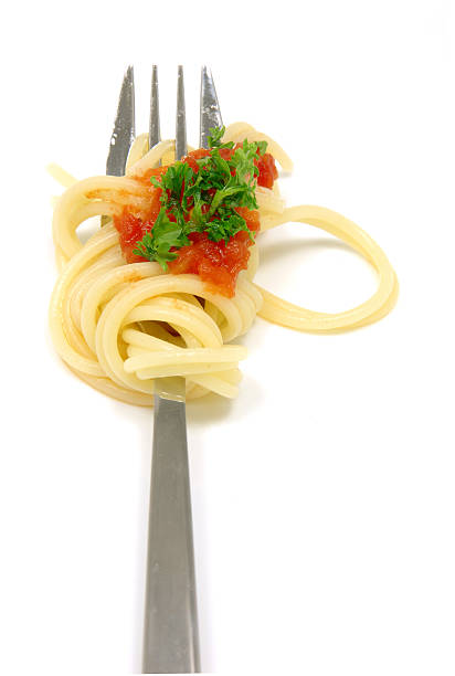 istock Spaghetti on fork with tomato sauce and parsley 91452470