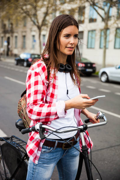 istock Woman cycling in Berlin downtown 914525892