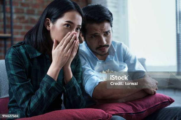 Couples Are Watching Movies At Home Hes Thrilled With The Movie Stock Photo - Download Image Now