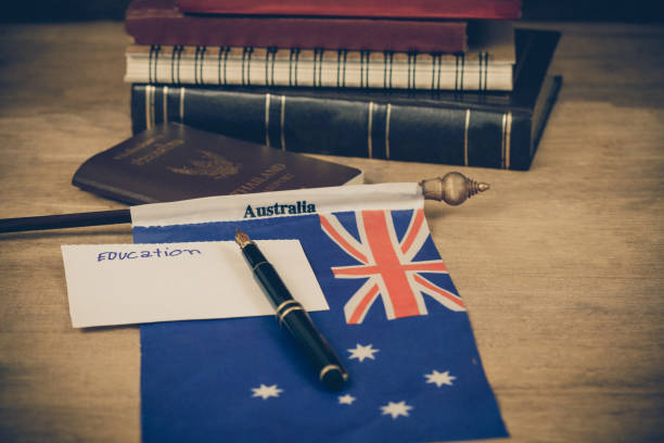 istock Education in Australia concept,passport and white note on Australia flag . 914530062