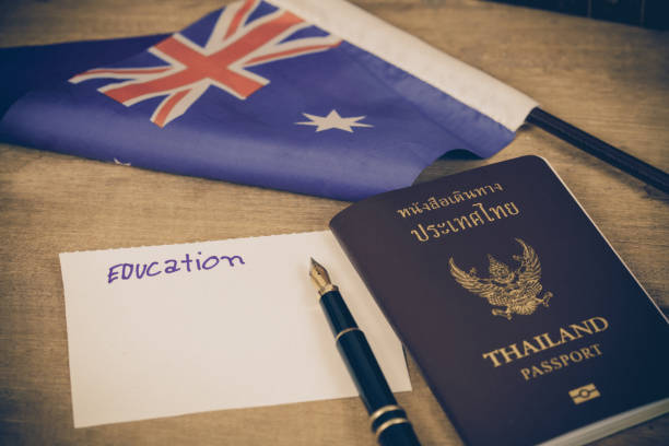 istock Education in Australia concept,passport and white note on Australia flag . 914530066