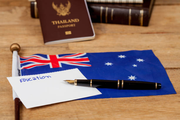 istock Education in Australia concept,passport and white note on Australia flag . 914530082