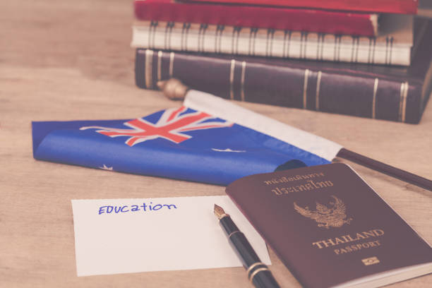 istock Education in Australia concept,passport and white note on Australia flag . 914530084